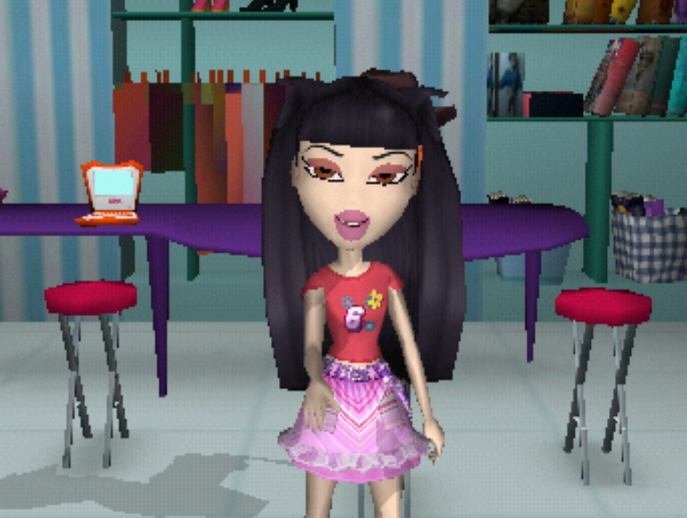 Jade is pale and has black hair worn in pigtails that go down to her waist. Her eyes are brown. She is wearing a coral pink shirt with flowers and the number 6 on it and a pink and purple skirt with a stripey patchwork texture.